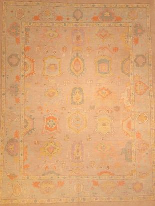 A close up of a rug with a floral pattern on it.