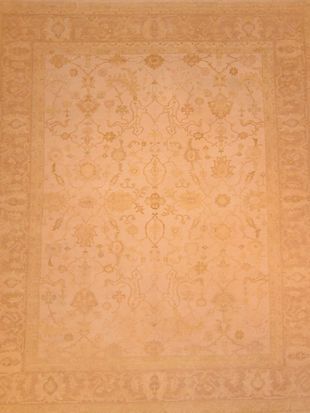 A close up of a rug with a floral pattern on it.