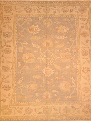 A rug with a floral pattern on it is sitting on a table.