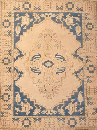 A rug with a blue and white pattern on it.