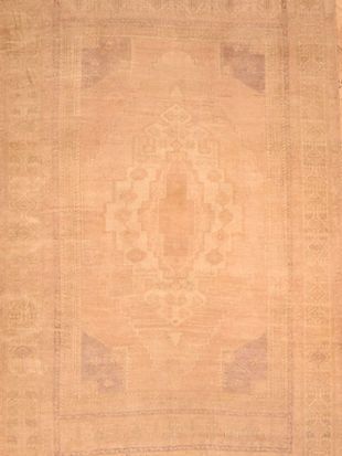 A close up of a rug with a pattern on it.