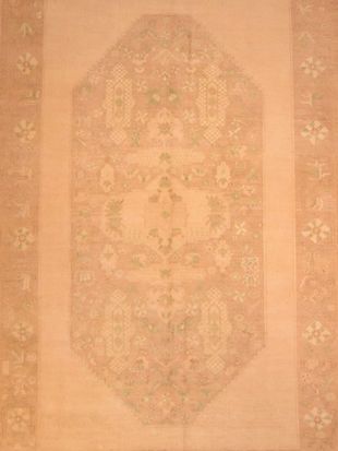 A close up of a rug with a floral pattern on it.