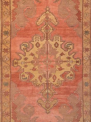 A close up of a rug with a pattern on it
