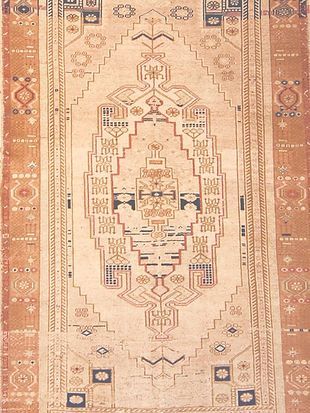 A close up of a rug with a pattern on it