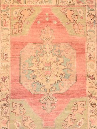 A close up of a rug with a pattern on it.