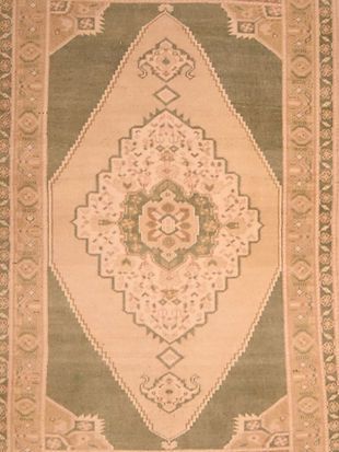 A rug with a floral pattern on it