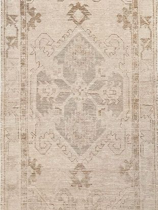 A close up of a rug with a pattern on it.