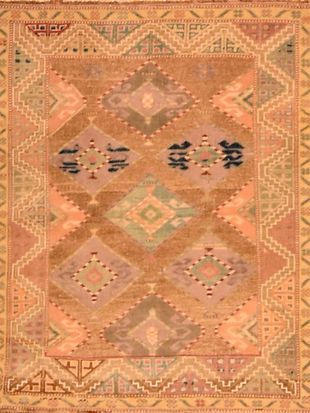 A close up of a rug with a geometric pattern on it.