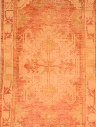 A close up of a rug with a pattern on it