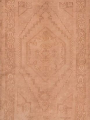 A close up of a brown rug with a pattern on it.