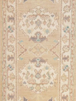A close up of a rug with a floral pattern on it.