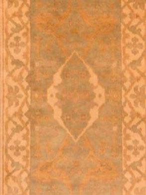 A close up of a rug with a pattern on it.