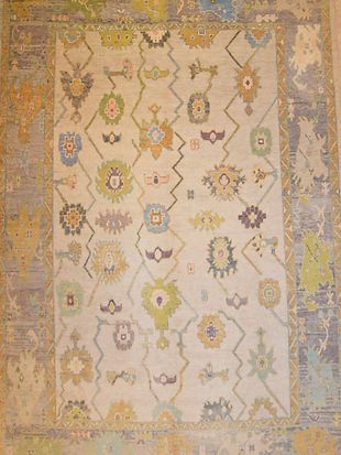 A rug with a pattern on it is sitting on a table.