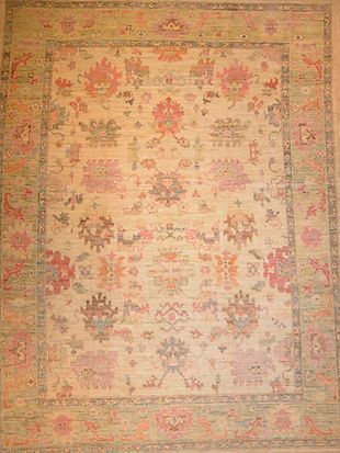 A rug with a floral pattern on it is sitting on a table.