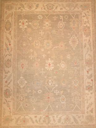 A rug with a floral pattern on it is sitting on a table.
