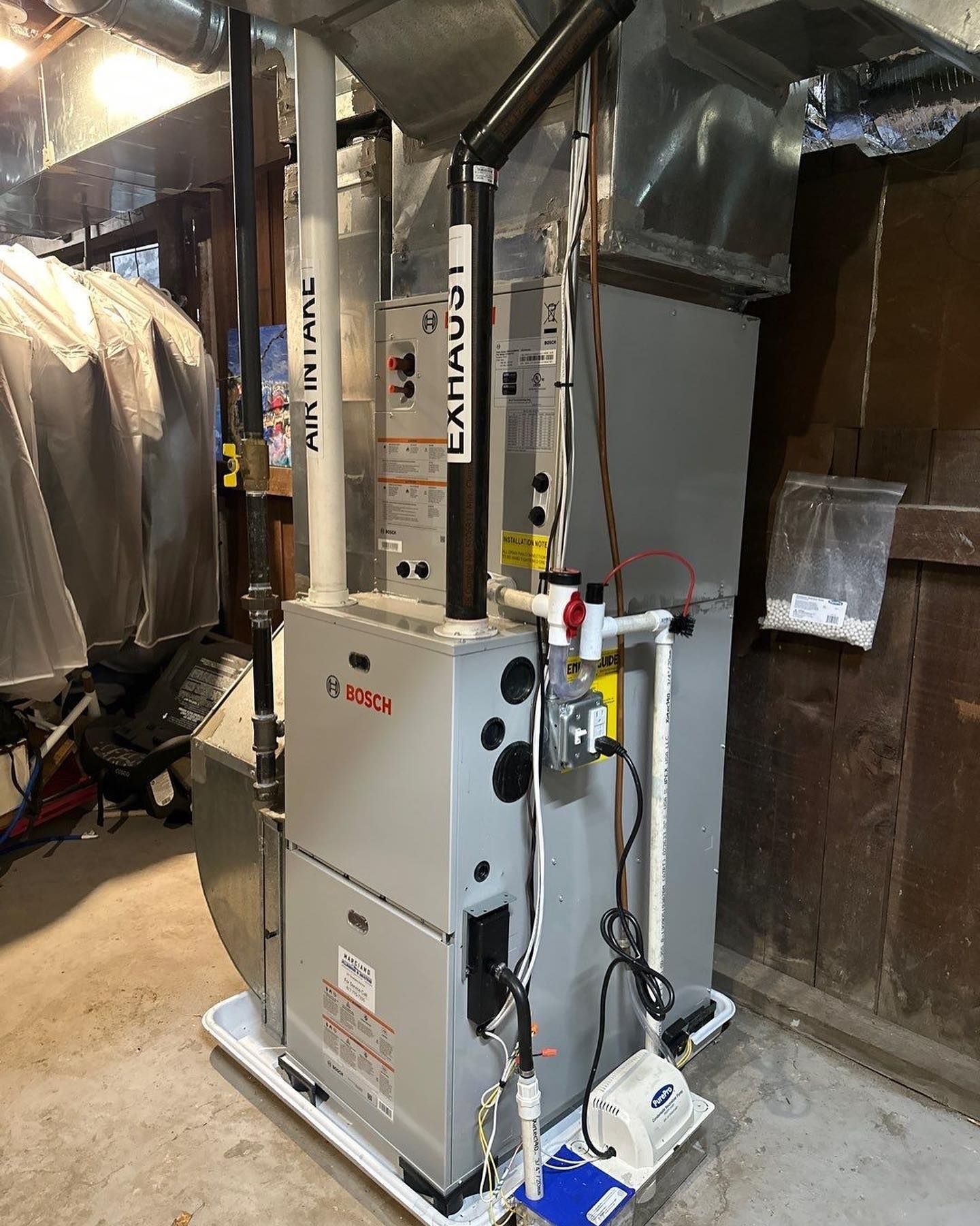 a heating and cooling system is sitting in a basement