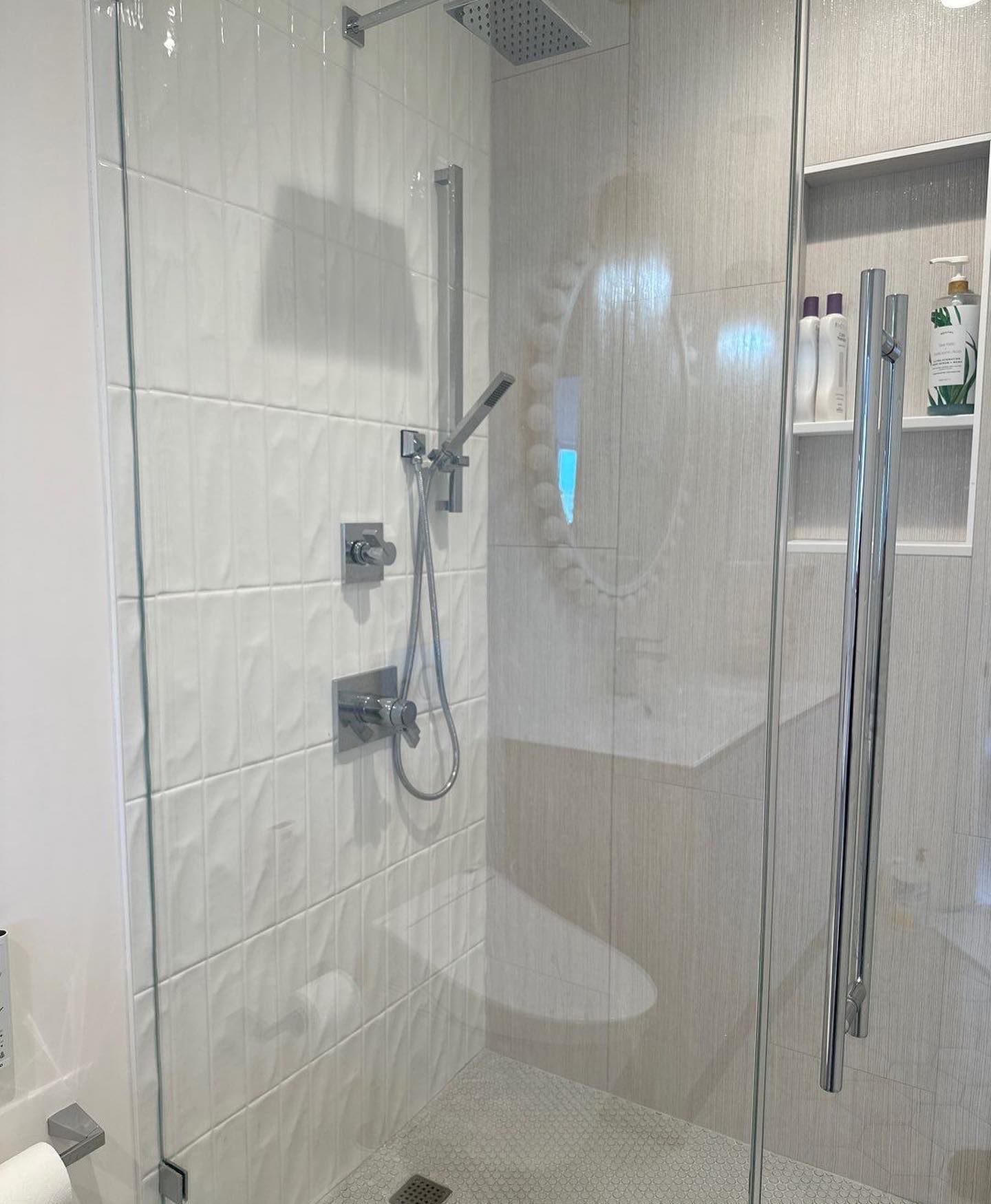 a bathroom with a walk in shower and a toilet