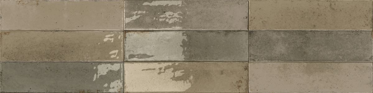Weathered tan and gray stone tile wall with a rough, textured surface