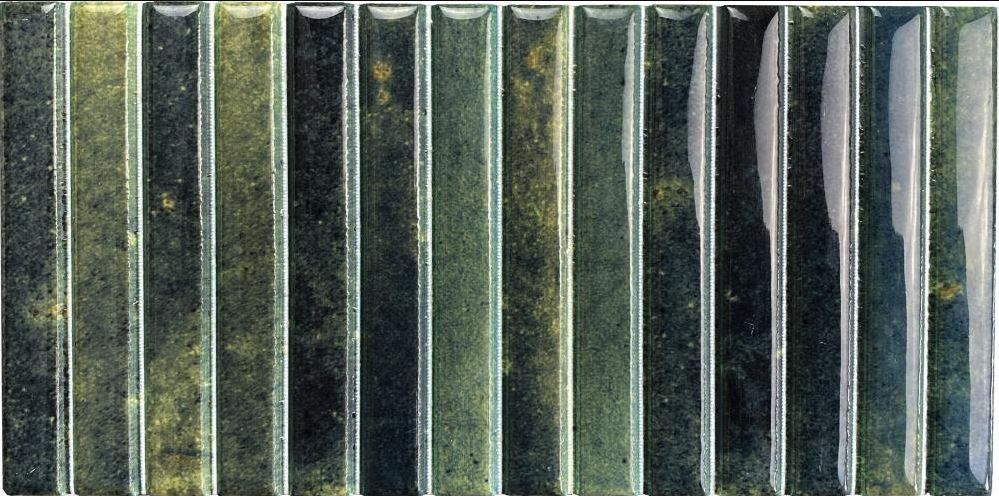 Top-down view of a striped green and gray corrugated roof or fence surface