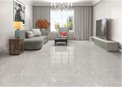 A modern living room with light gray marble floors, a gray sofa, a side table with a lamp, a TV console, and curtains.
