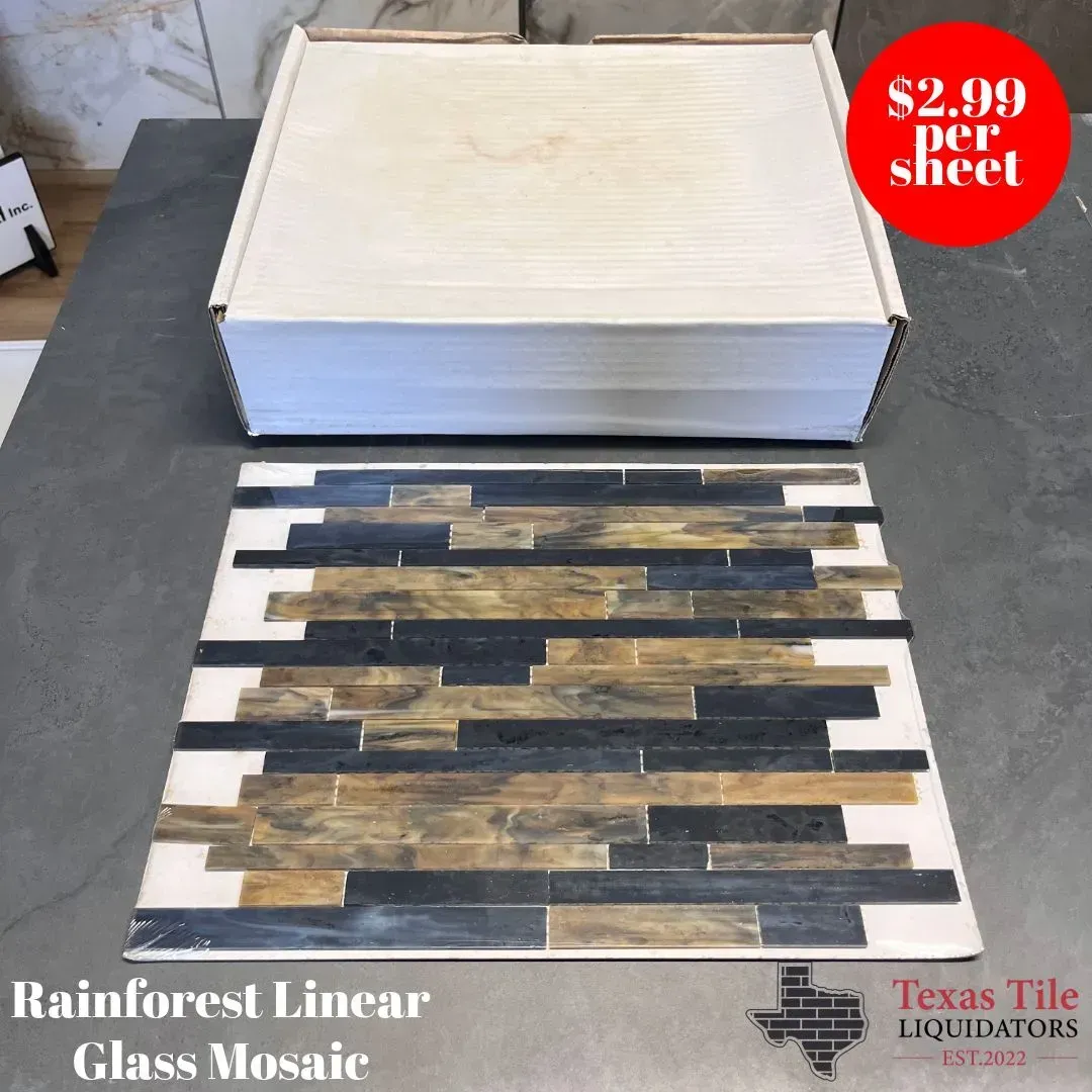 A sheet of Rainforest Linear Glass Mosaic tile featuring black and brown strips, sitting below a white box for $2.99/sheet.