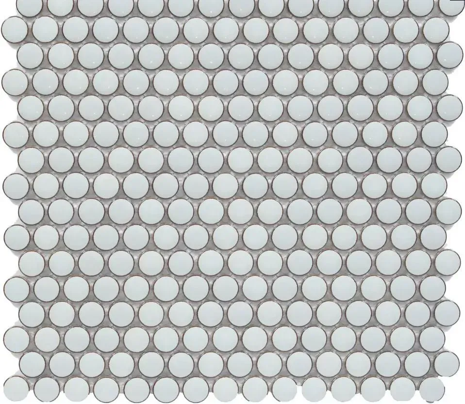 A grid of light blue, circular mosaic tiles arranged in a staggered, honeycomb-like pattern.