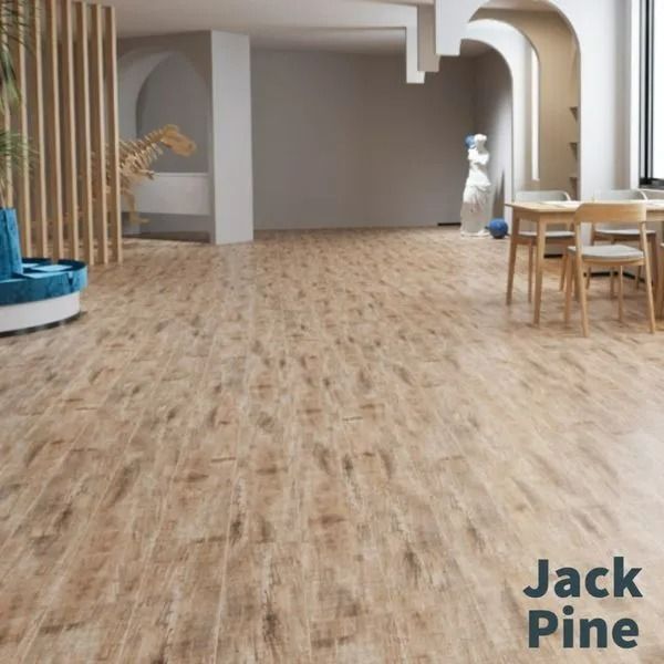 A spacious, modern room with light wood-grain flooring labeled