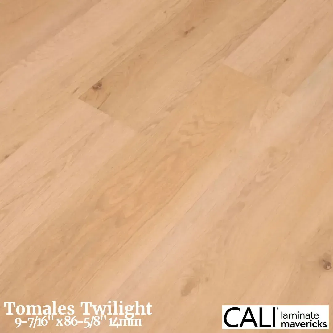 Light-toned wood plank flooring with natural grain and knots, branded as CALI Mavericks Tomales Twilight.