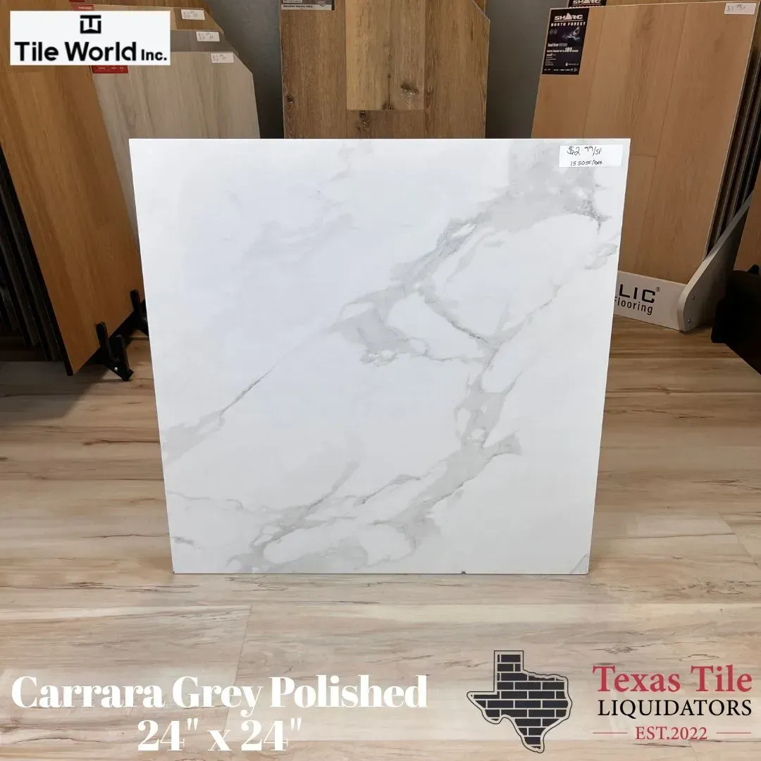 White Carrara Grey polished tile slab displayed in a showroom, with light gray veining.