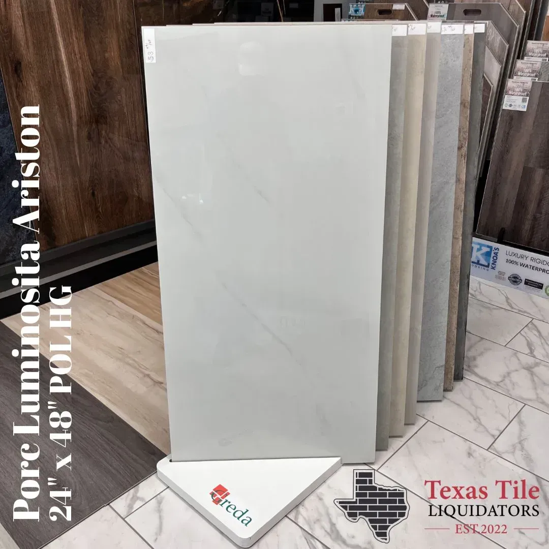 Display of white and gray large-format tiles at Texas Tile Liquidators