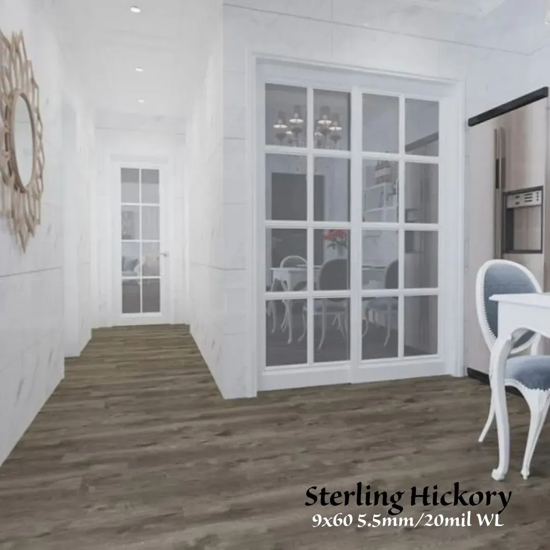 Bright white interior with French doors, wood flooring, and a white chair beside a decorative wall.