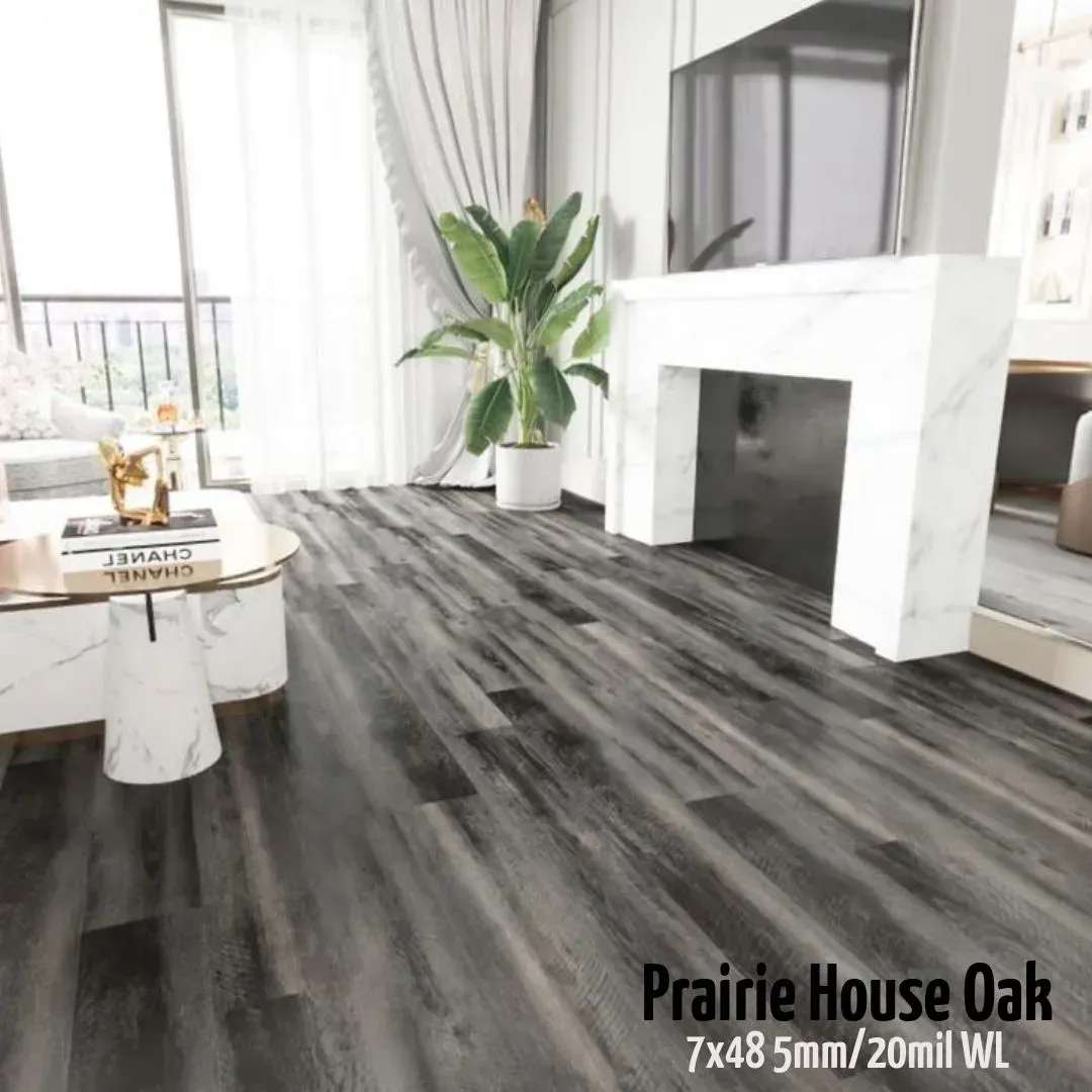 Interior view featuring Prairie House Oak flooring, showcasing wood-look planks in shades of grey and black.