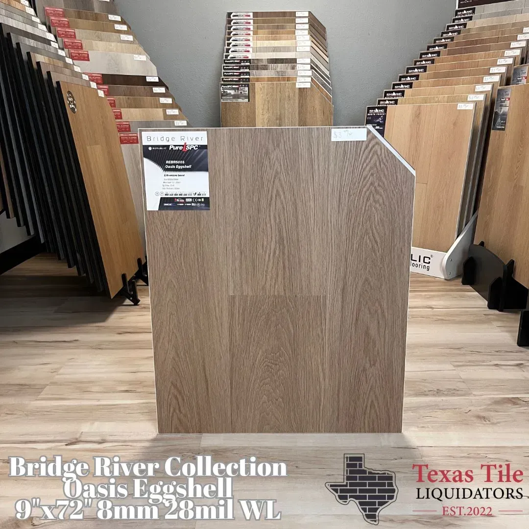 A display of Oasis Eggshell luxury vinyl plank flooring from the Bridge River Collection at Texas Tile Liquidators.