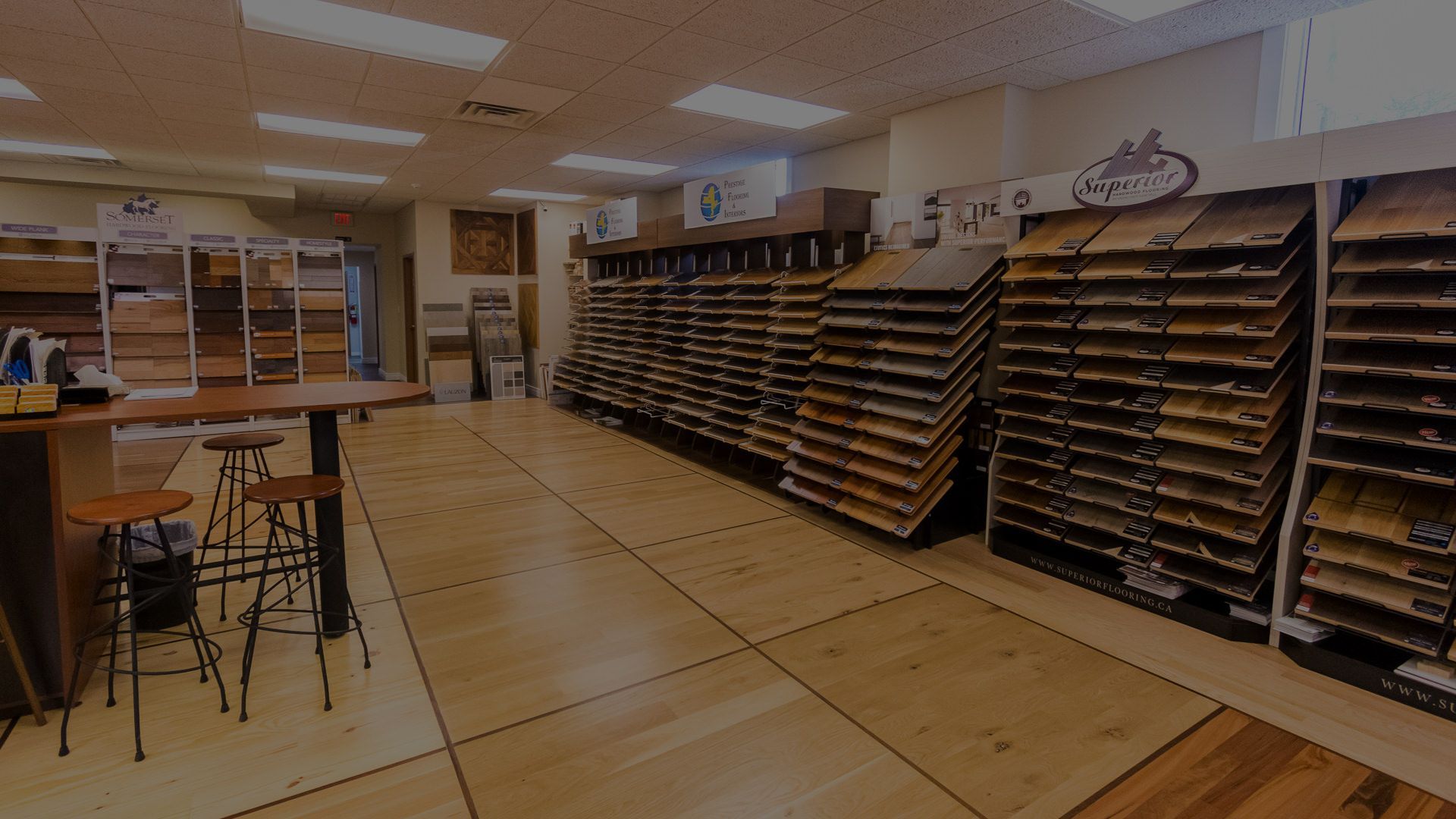 A store filled with lots of wooden flooring samples.