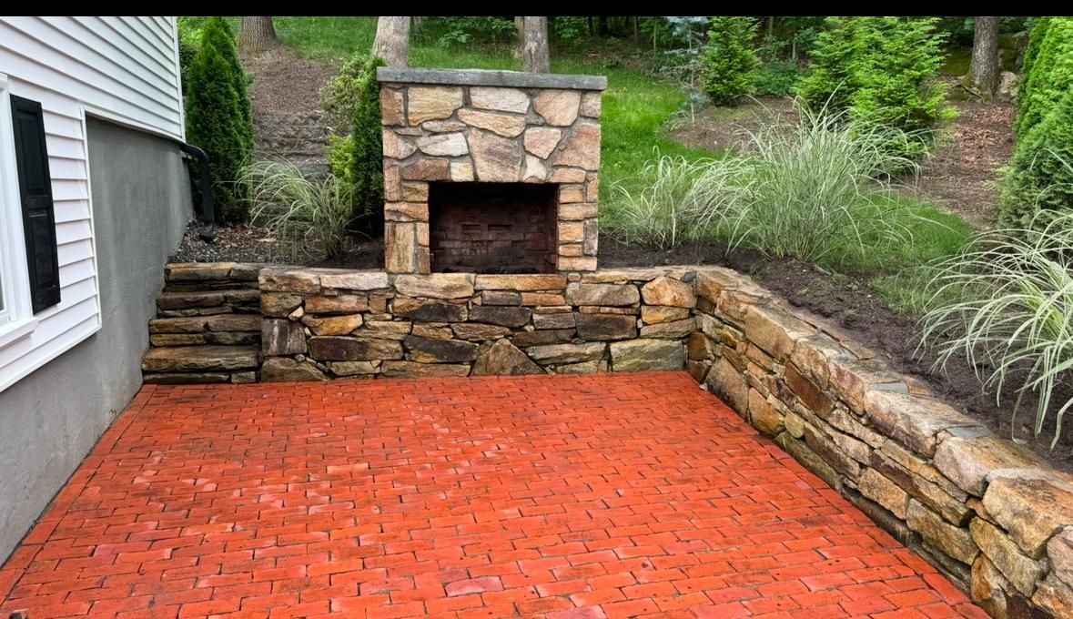 Brick patio with fireplace