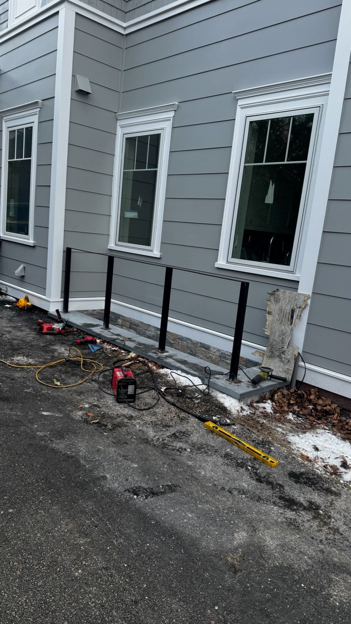 A building with a lot of windows is being remodeled.