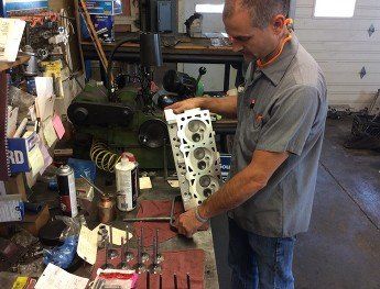 Man working on auto parts