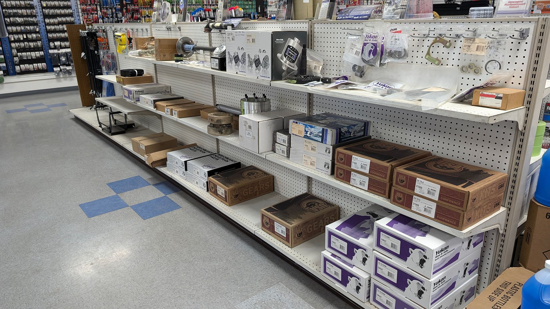 Shelves stocked with hardware items in a store