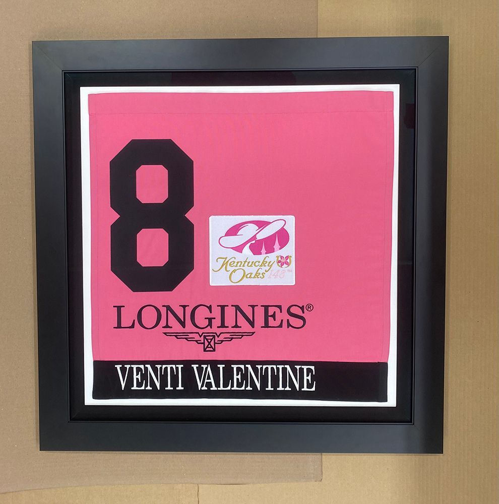 A framed sign that says longines venti valentine