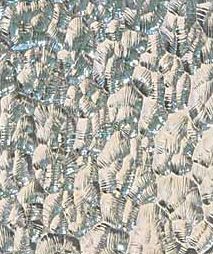A close up of a piece of glass with a very interesting texture.