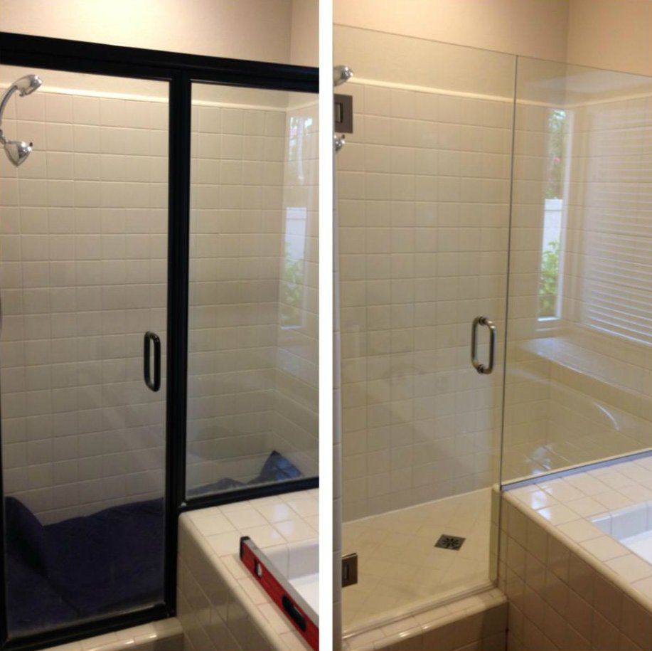 A bathroom with a sliding glass shower door