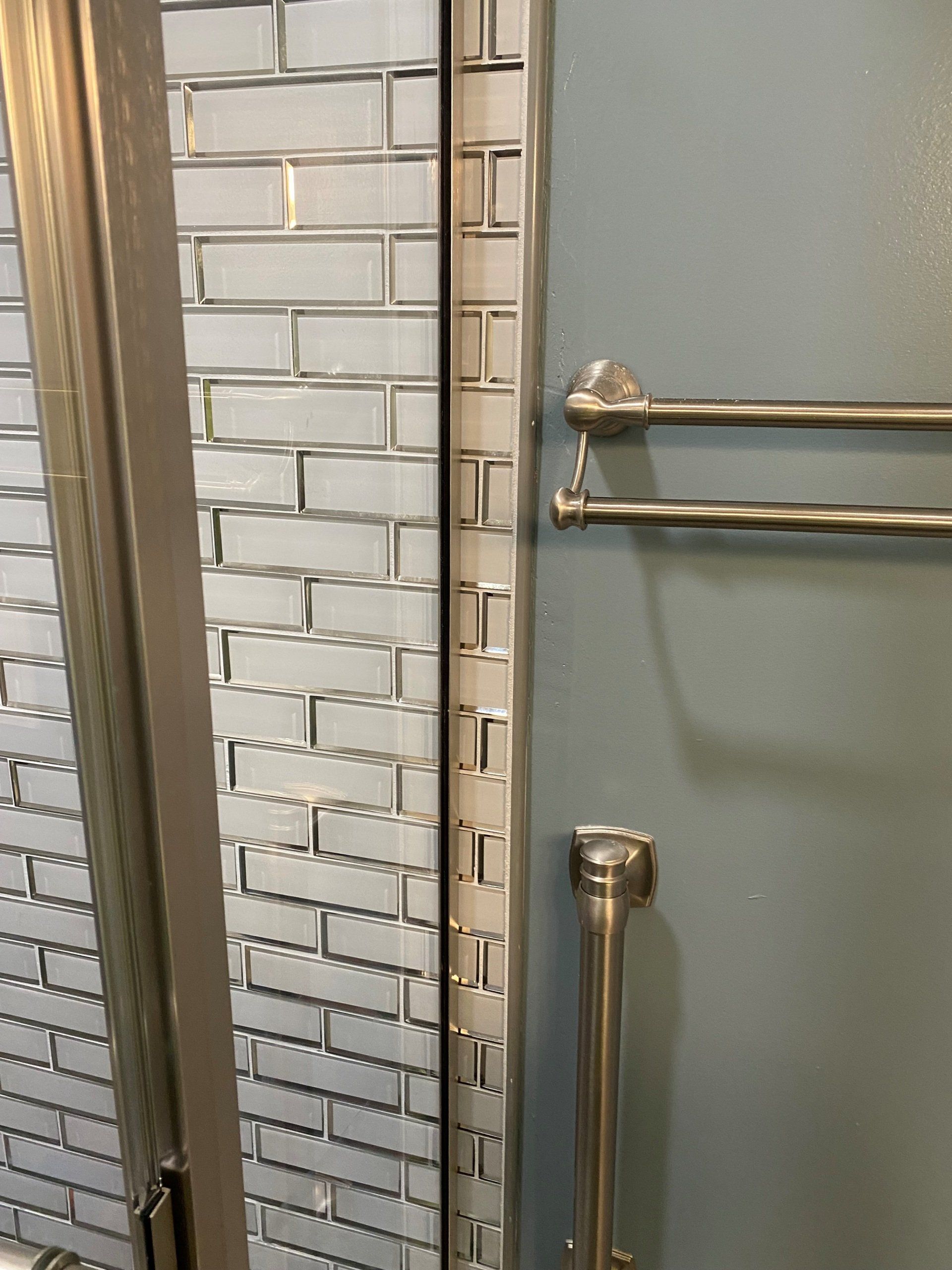 edge tile work to wall white tile glass doors