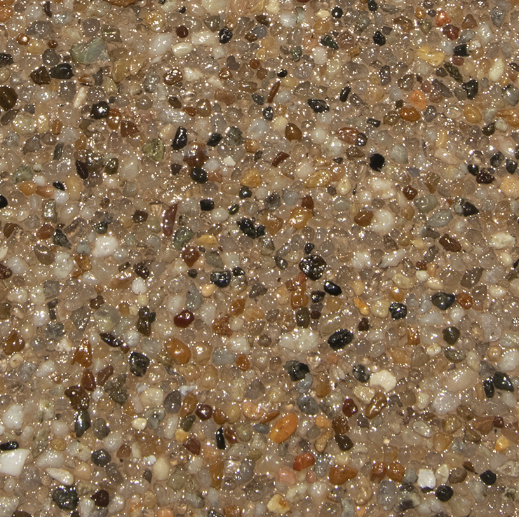 Brown pebble textured surface with highlights.