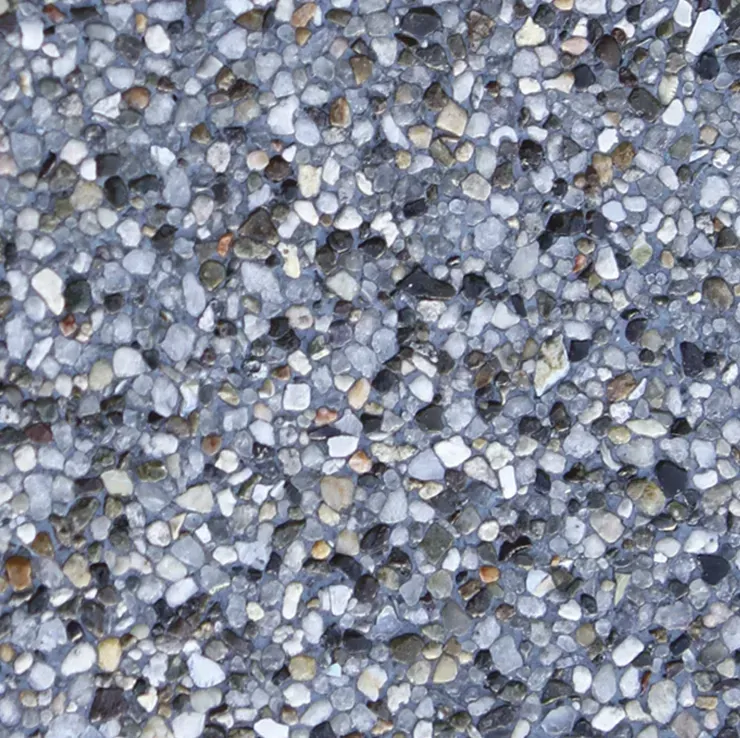 Gray and speckled pebble aggregate surface.