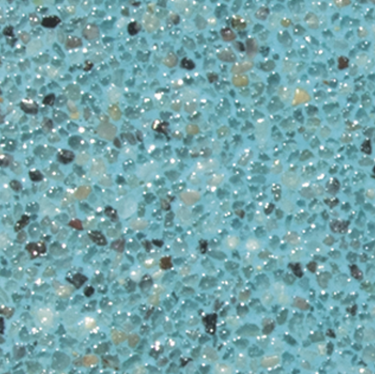 Blue pool plaster with small, speckled aggregate.