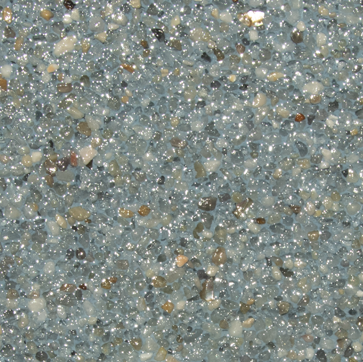 Textured, blue-gray aggregate surface with small, embedded pebbles, reflecting light.