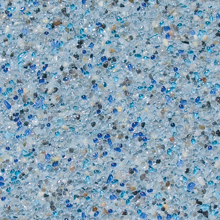 Blue and gray speckled pool finish with small, colorful aggregates.