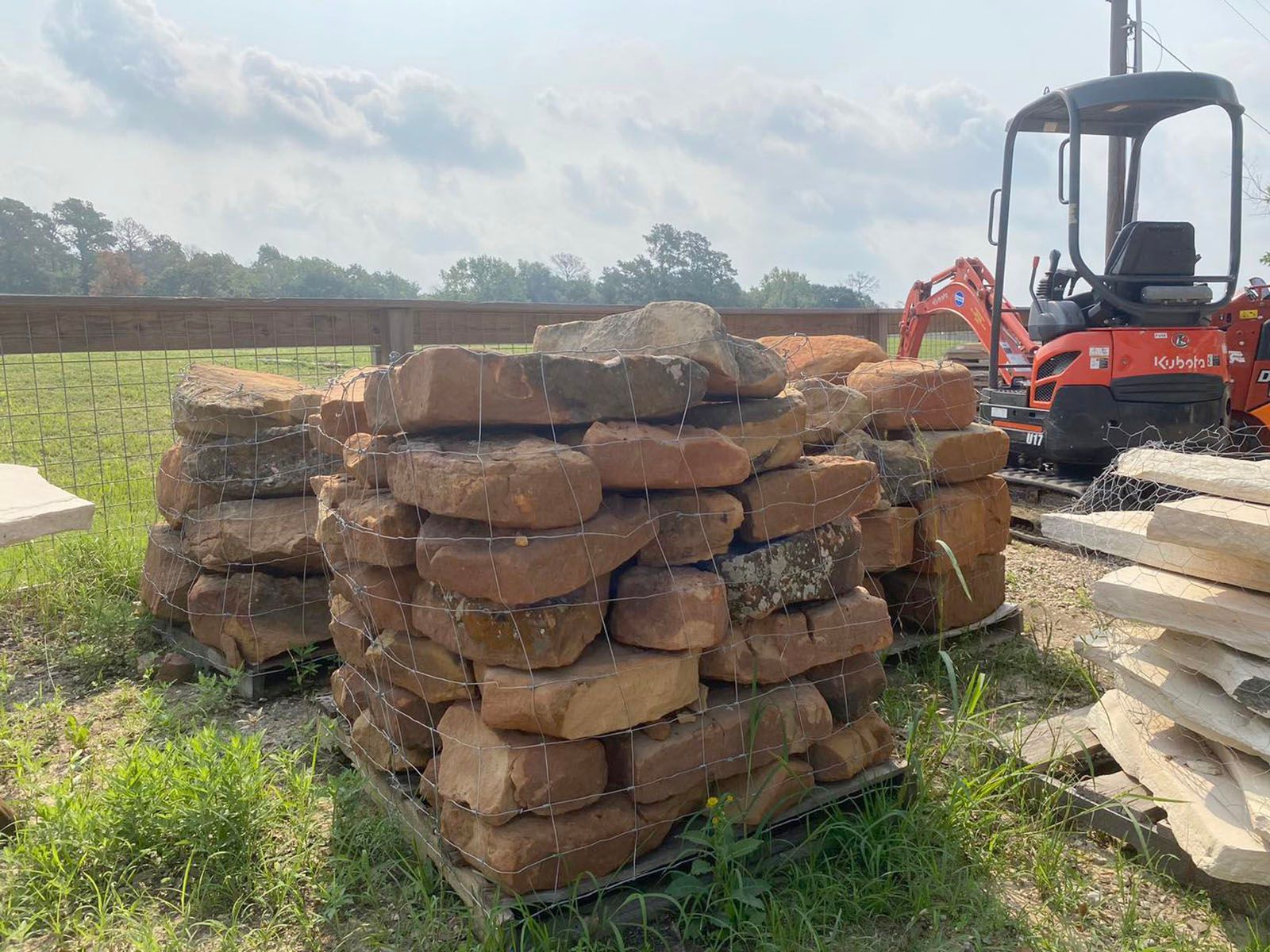 Large boulders for landscaping stacked up on each other