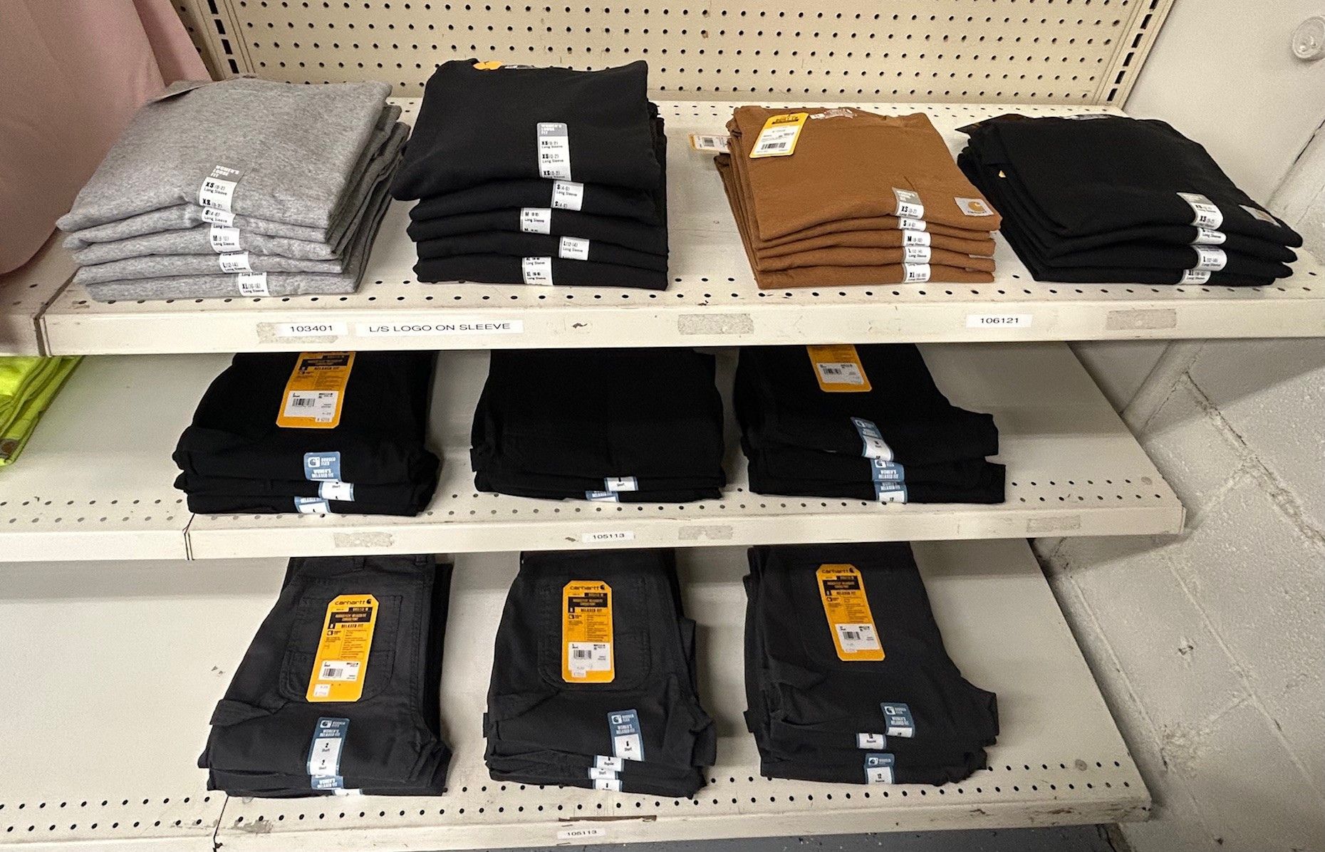 A carhartt woman logo on a black background