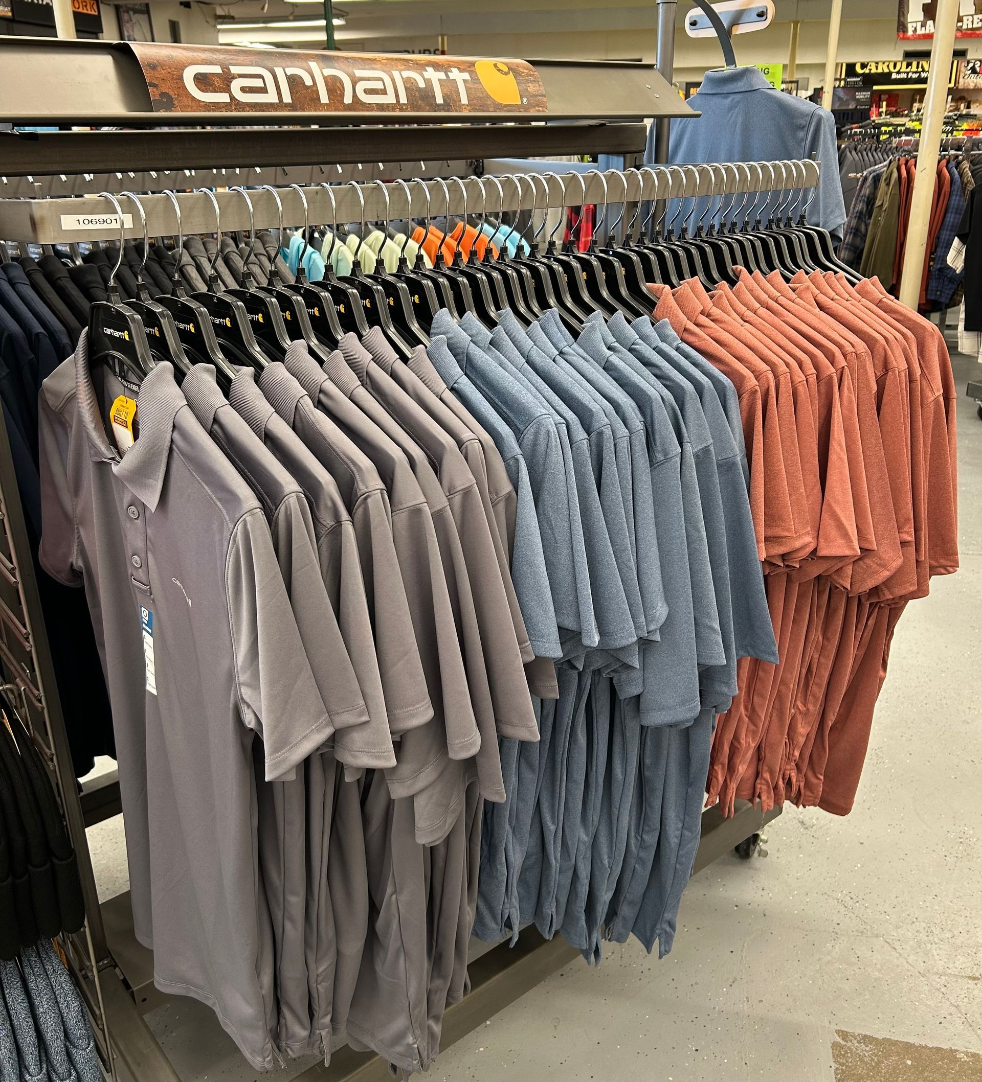 A display of carhartt shirts in a store